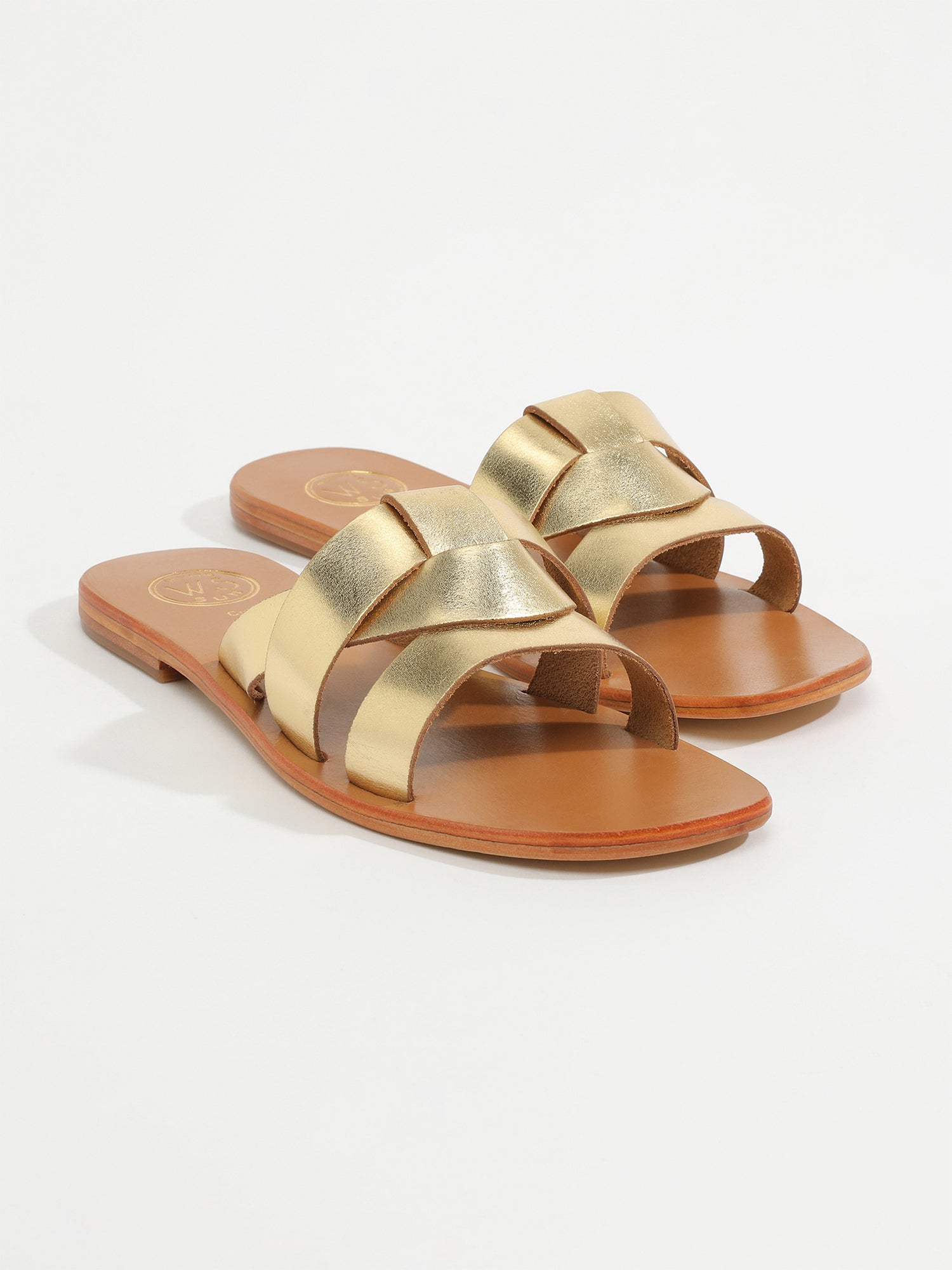NOHAM mules en cuir or foncé