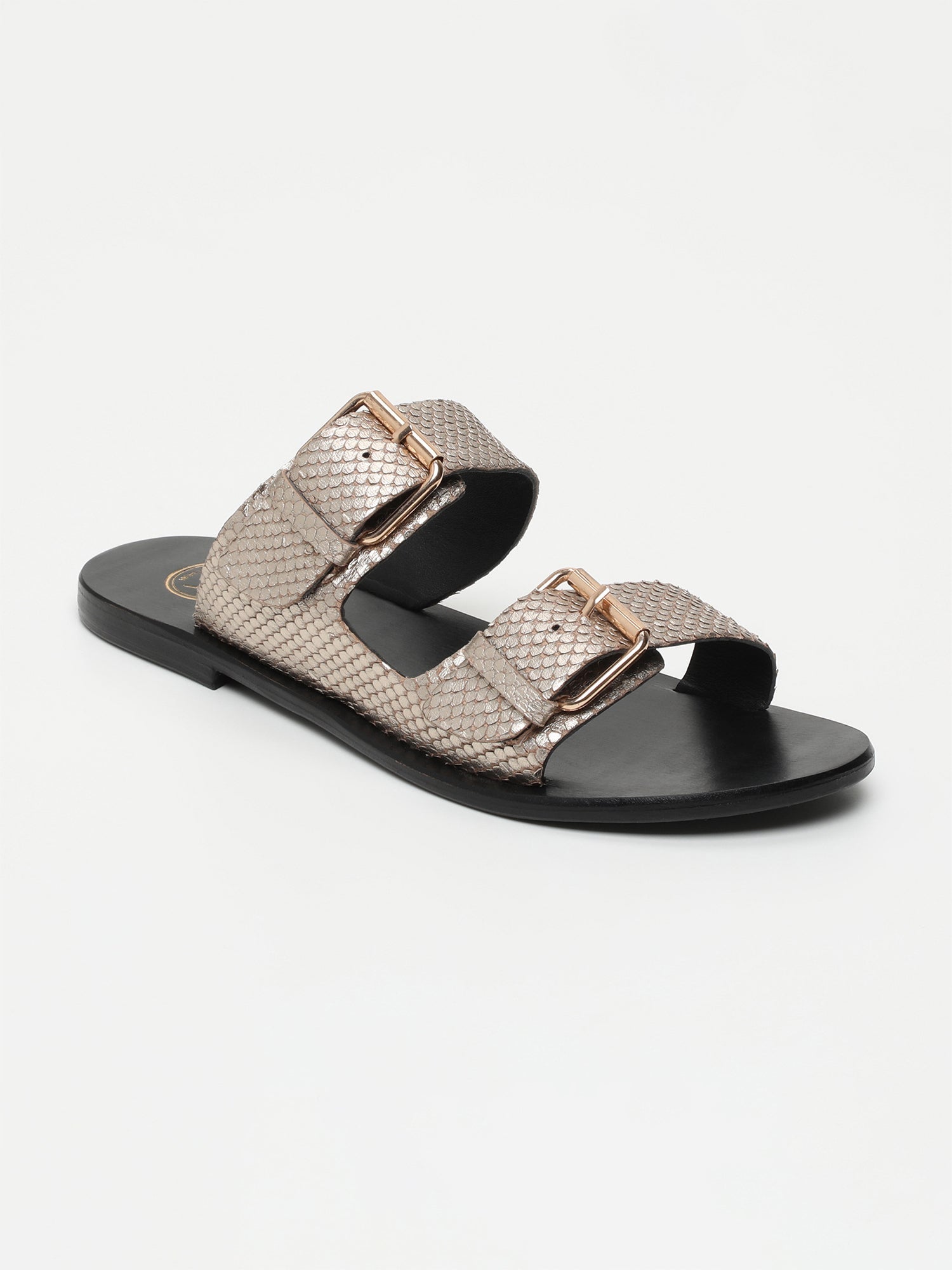 EDEN mules en cuir écailles