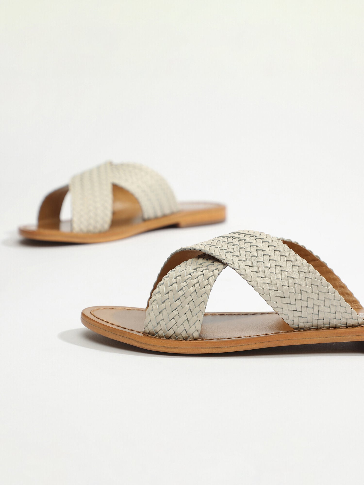 MALVARROSA mules tresse en cuir ivoire