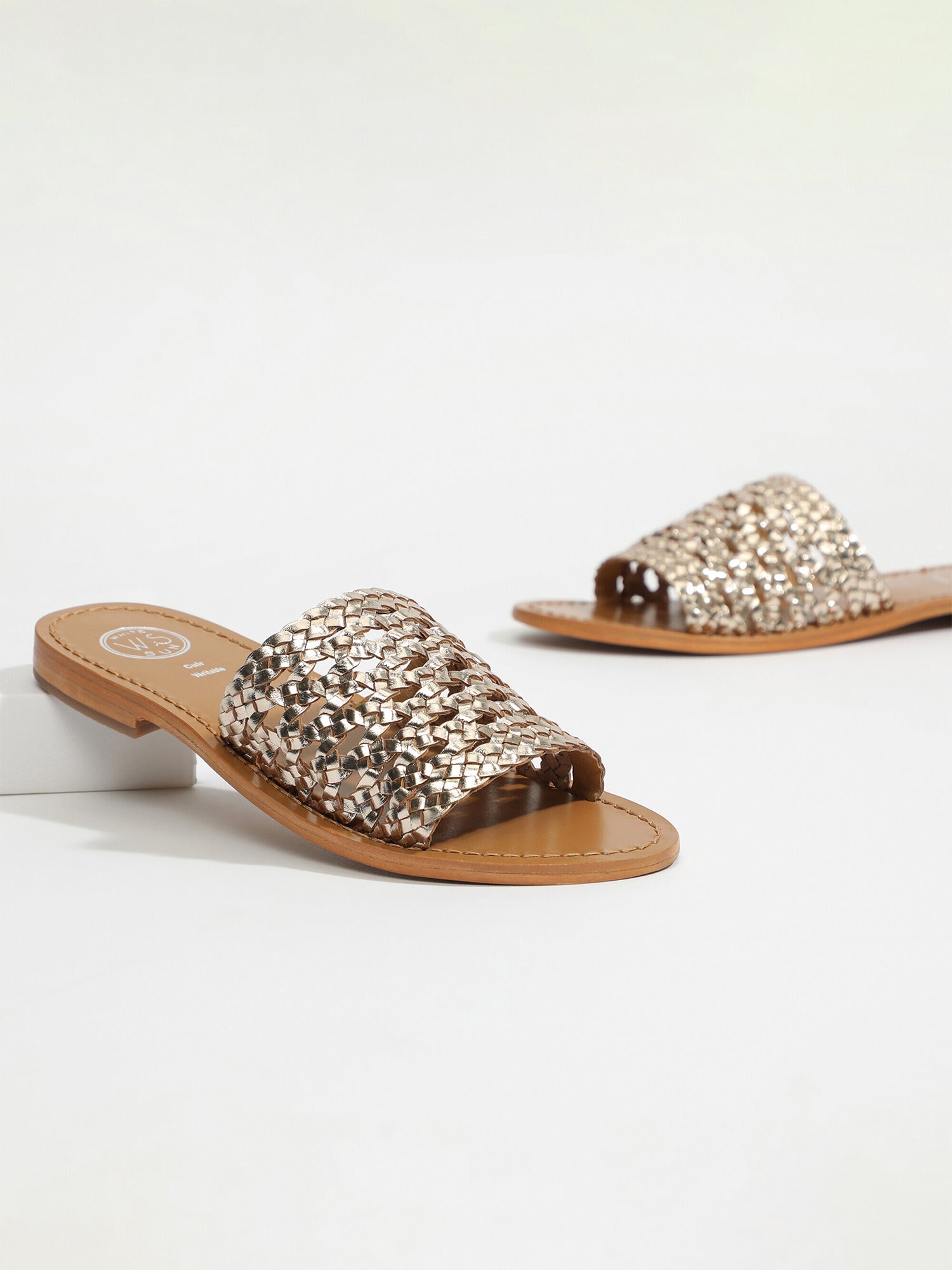 ALBORAYA mules tresse en cuir or