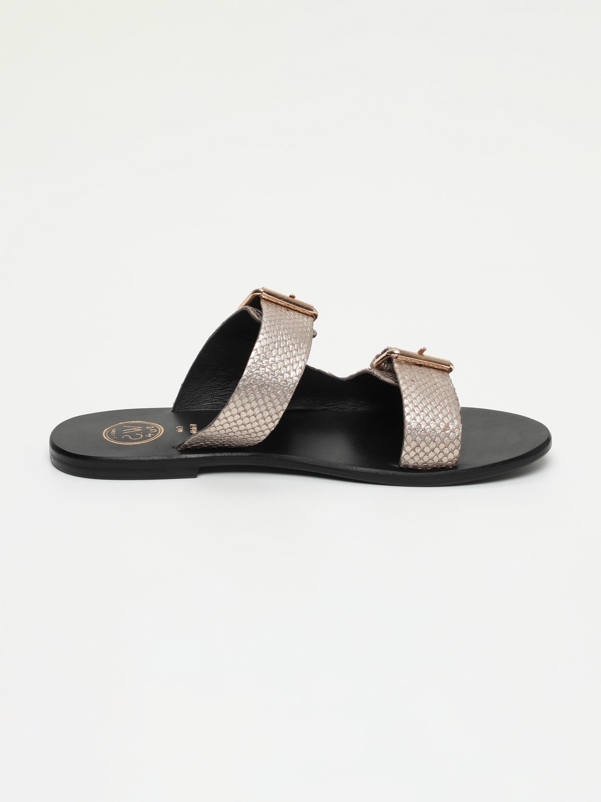 EDEN mules en cuir écailles