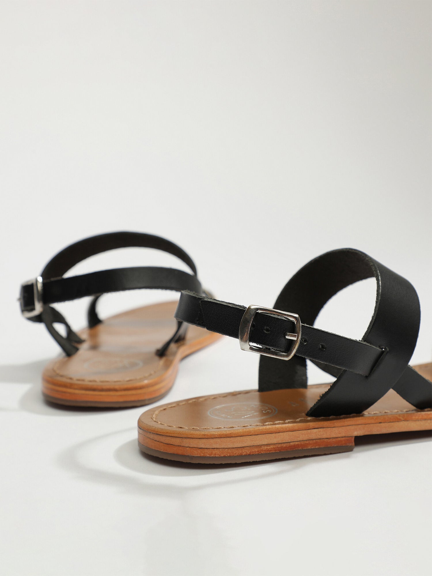 BURSA sandales animal bi-color en cuir noir et zebre