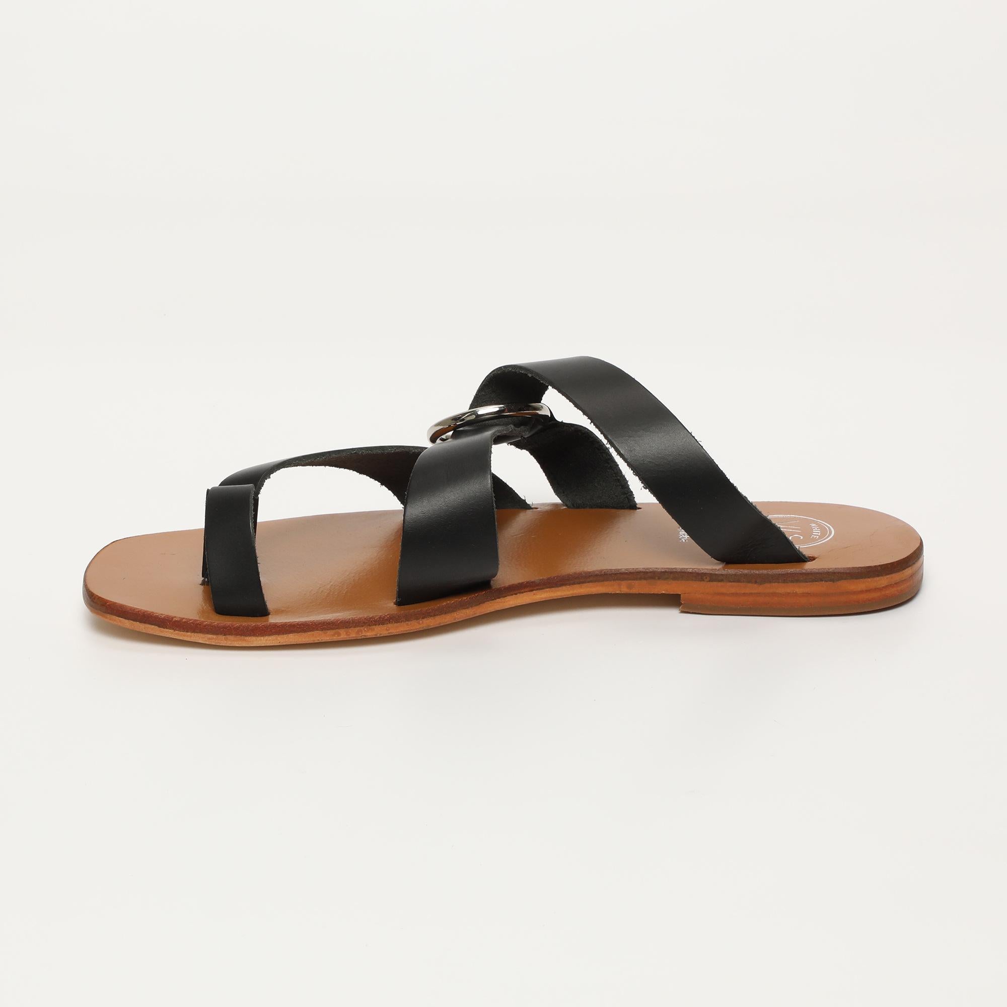 EMMA mules entre doigt en cuir noir