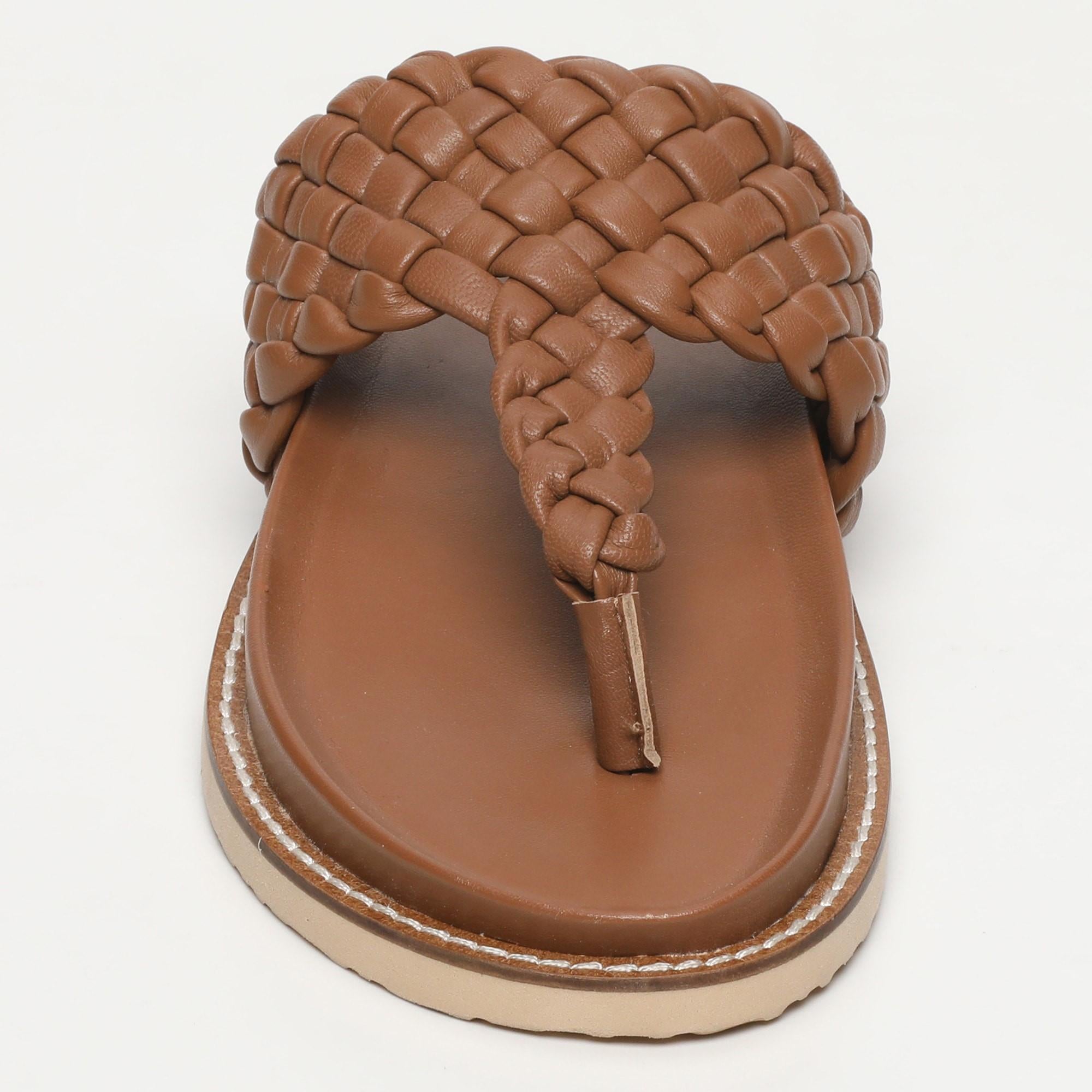 NAVAS mules entre doigt tresse en cuir camel