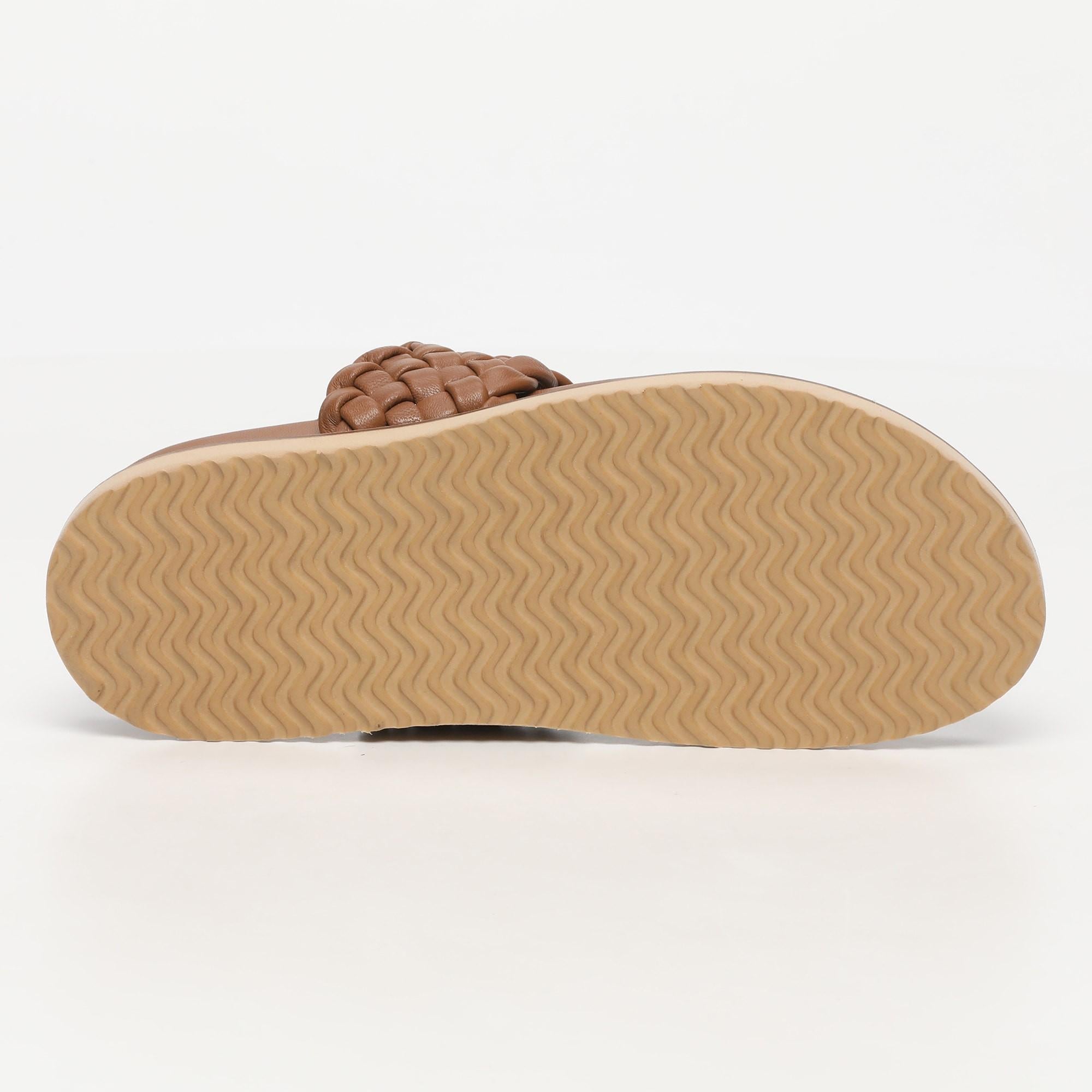 NAVAS mules entre doigt tresse en cuir camel