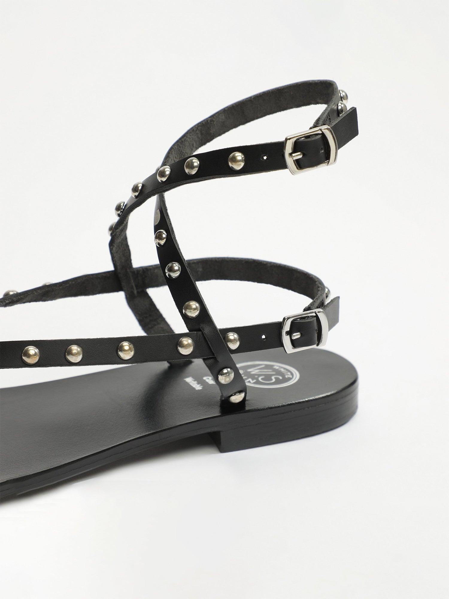 MELONA sandales spartiates entre doigt en cuir noir