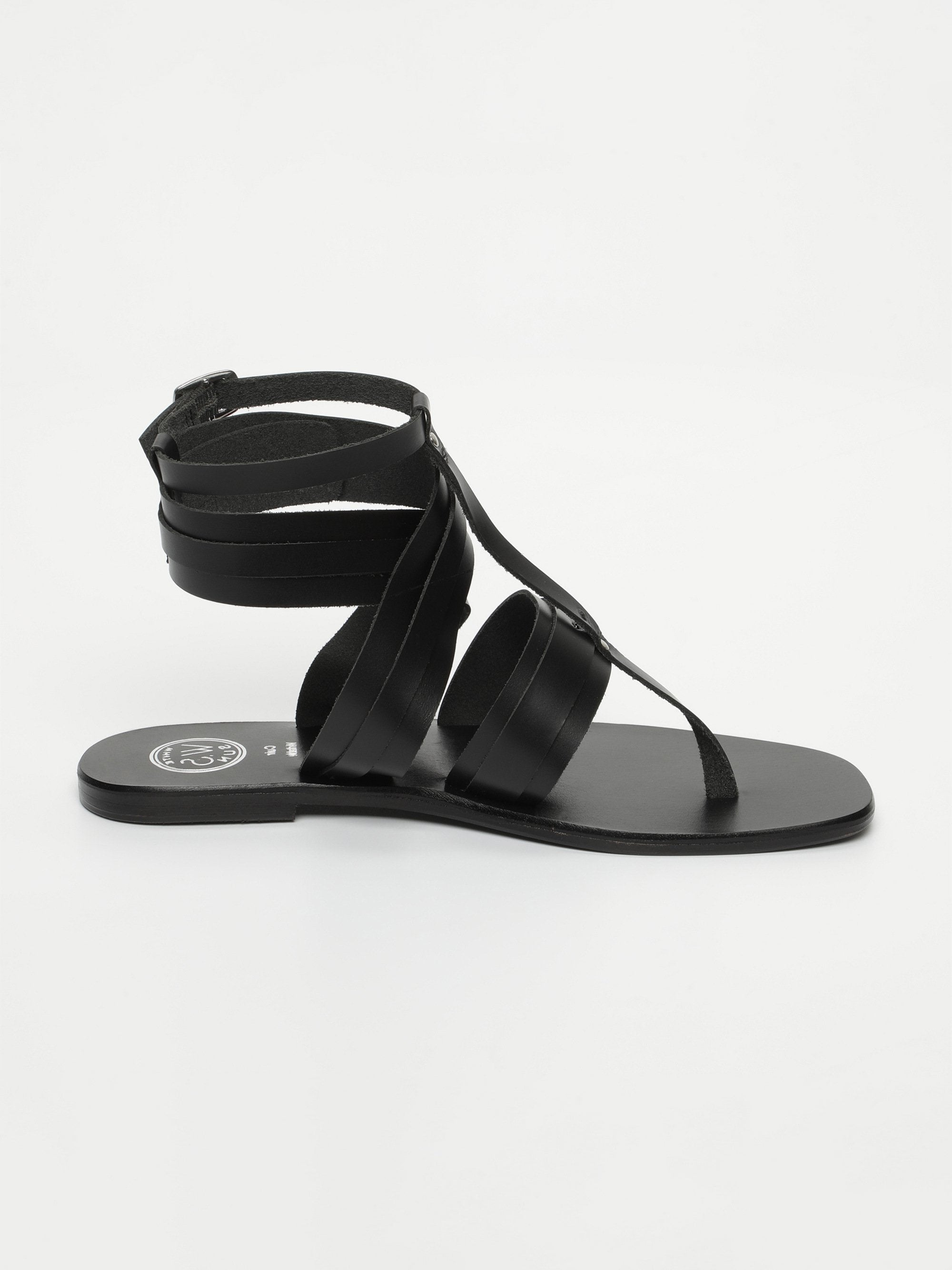 ANVERT sandales spartiates entre doigt en cuir noir
