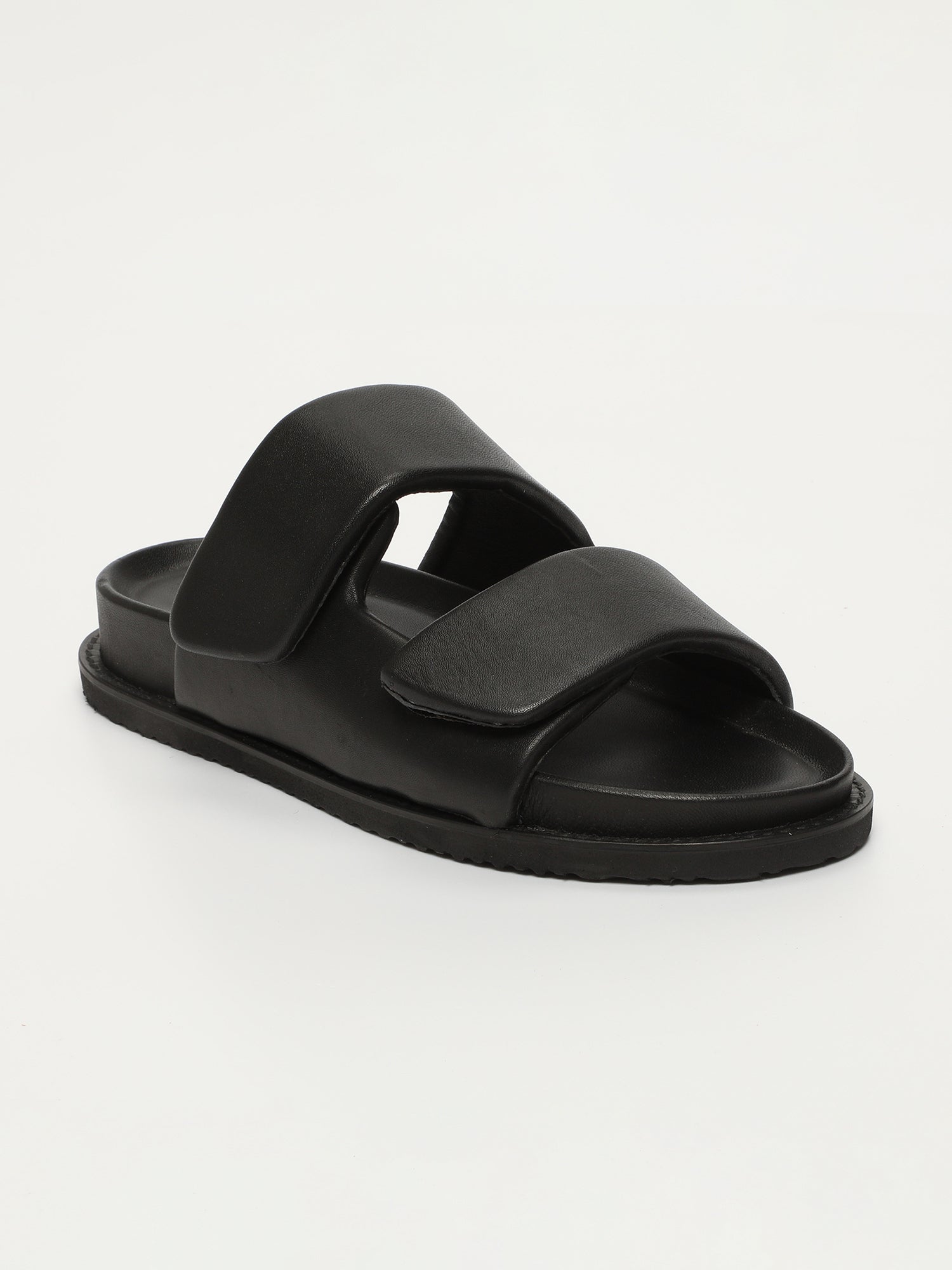 PENELOPE mules en cuir noir