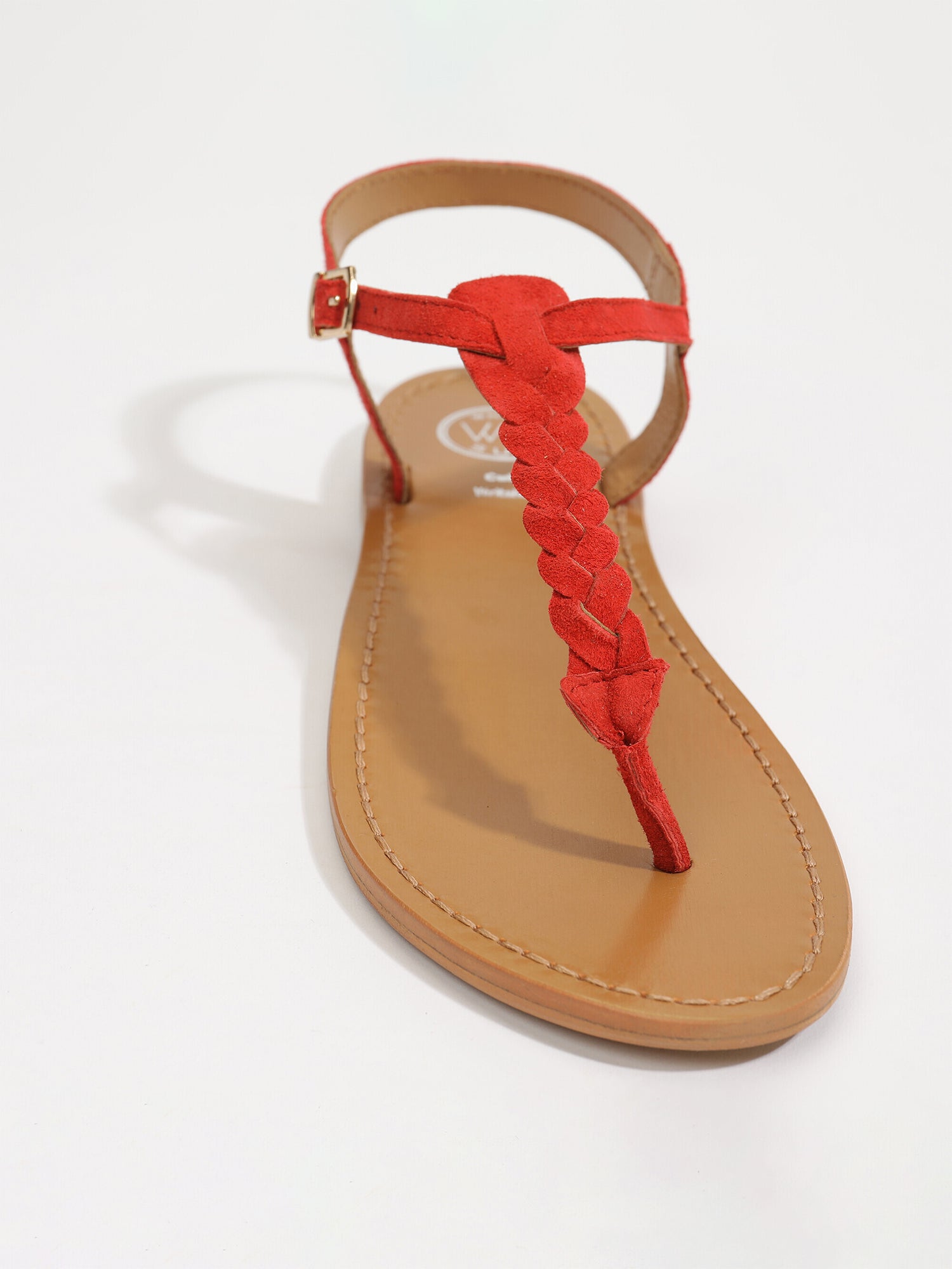 NATAL sandales entre doigt tresse en cuir rouge