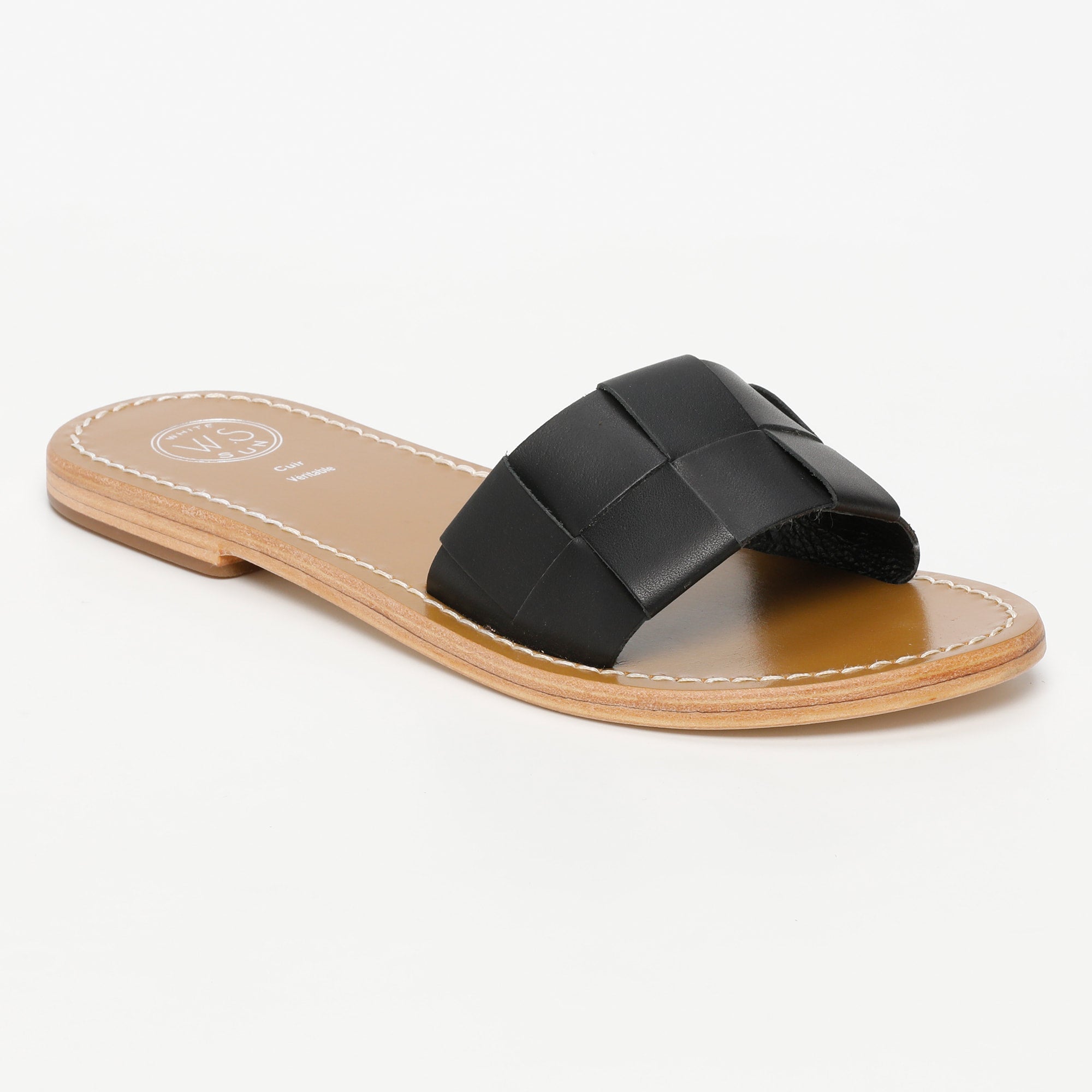 TUCANO mules en cuir noir