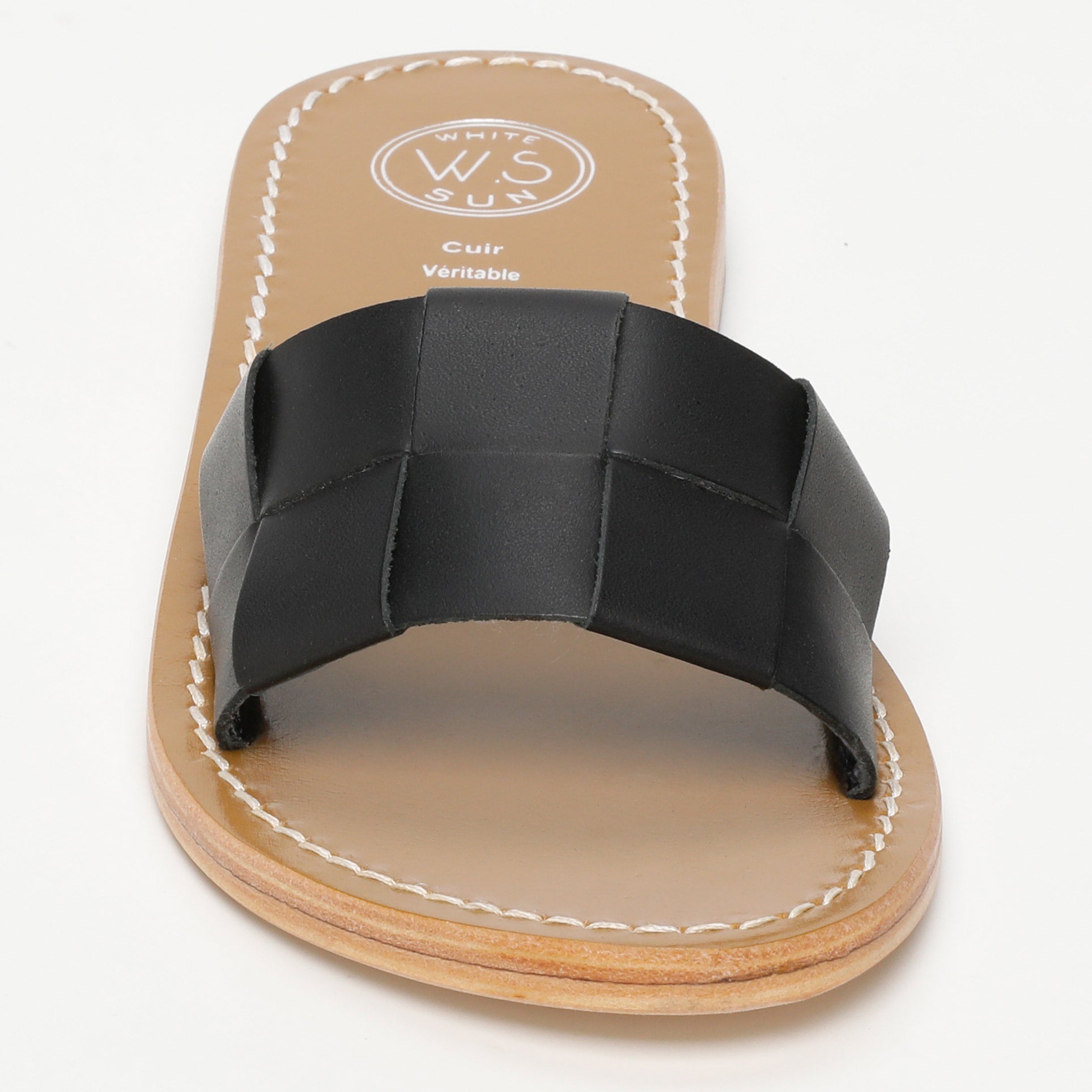 TUCANO mules en cuir noir