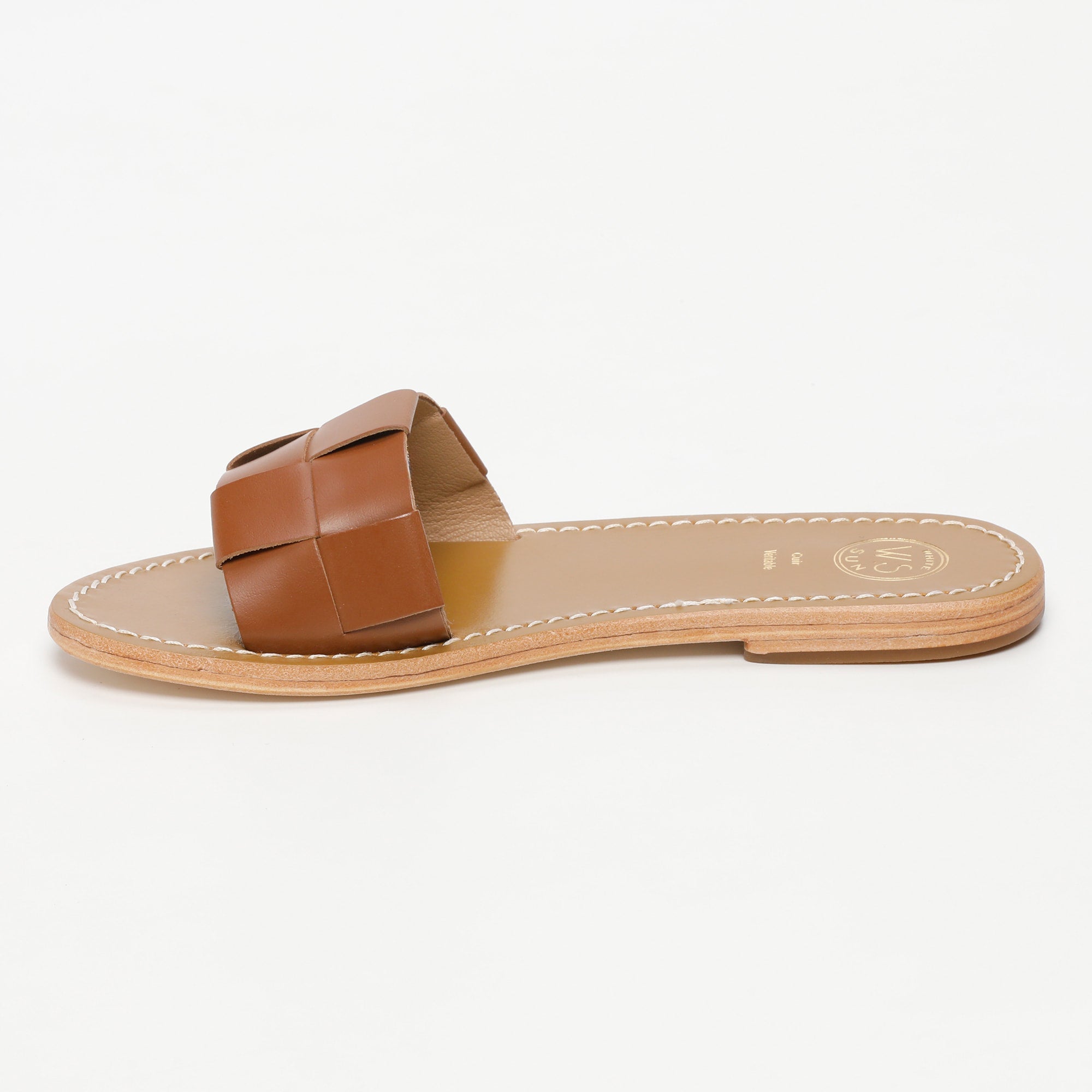 TUCANO mules en cuir camel