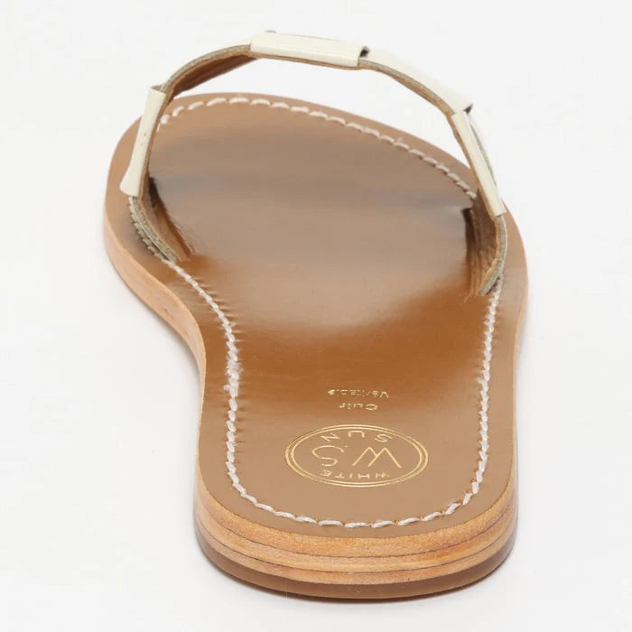 TUCANO mules en cuir ivoire verni