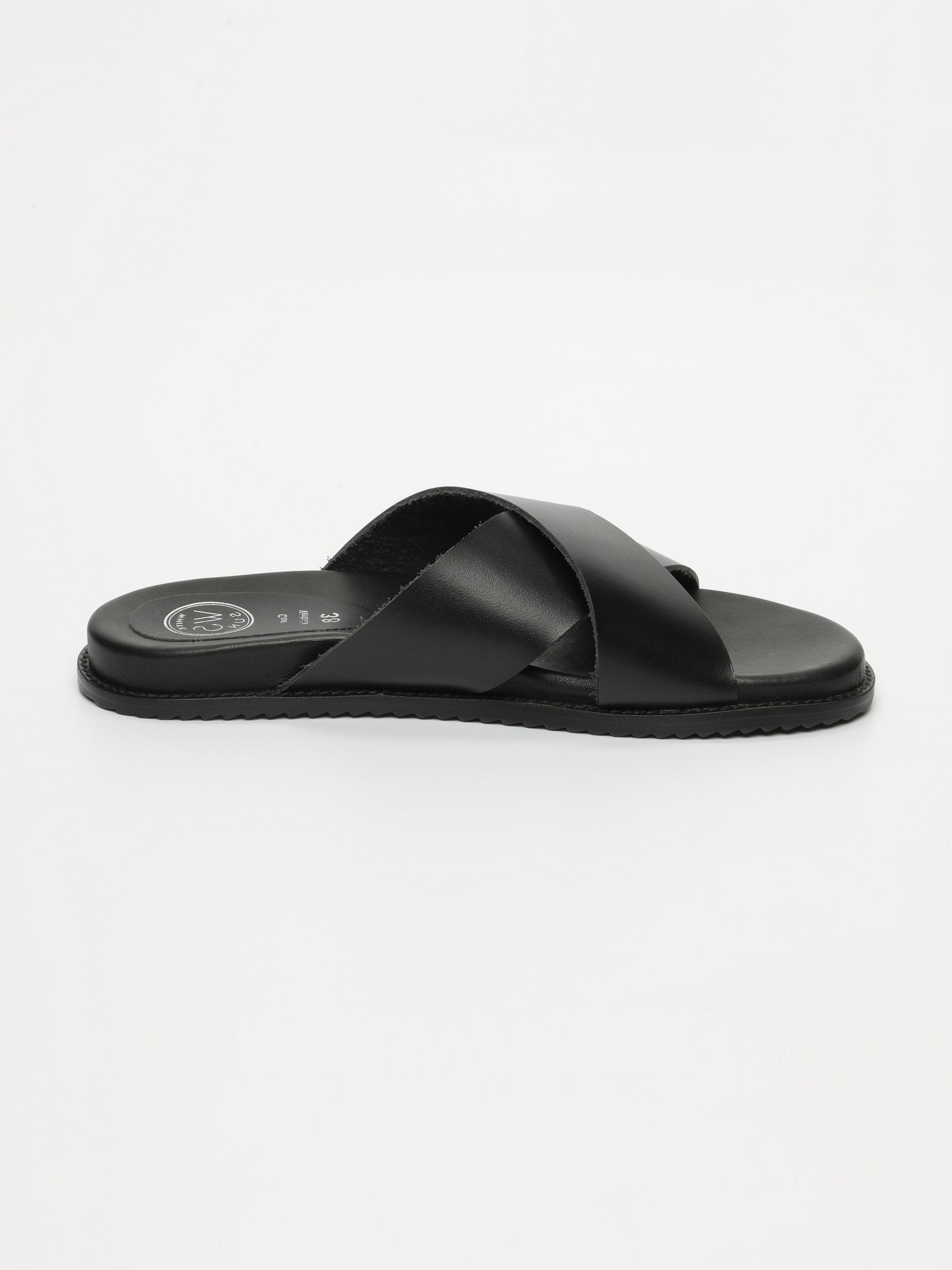 LOUTSIAN mules en cuir noir