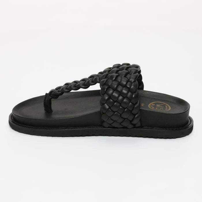 NAVAS mules en cuir noir