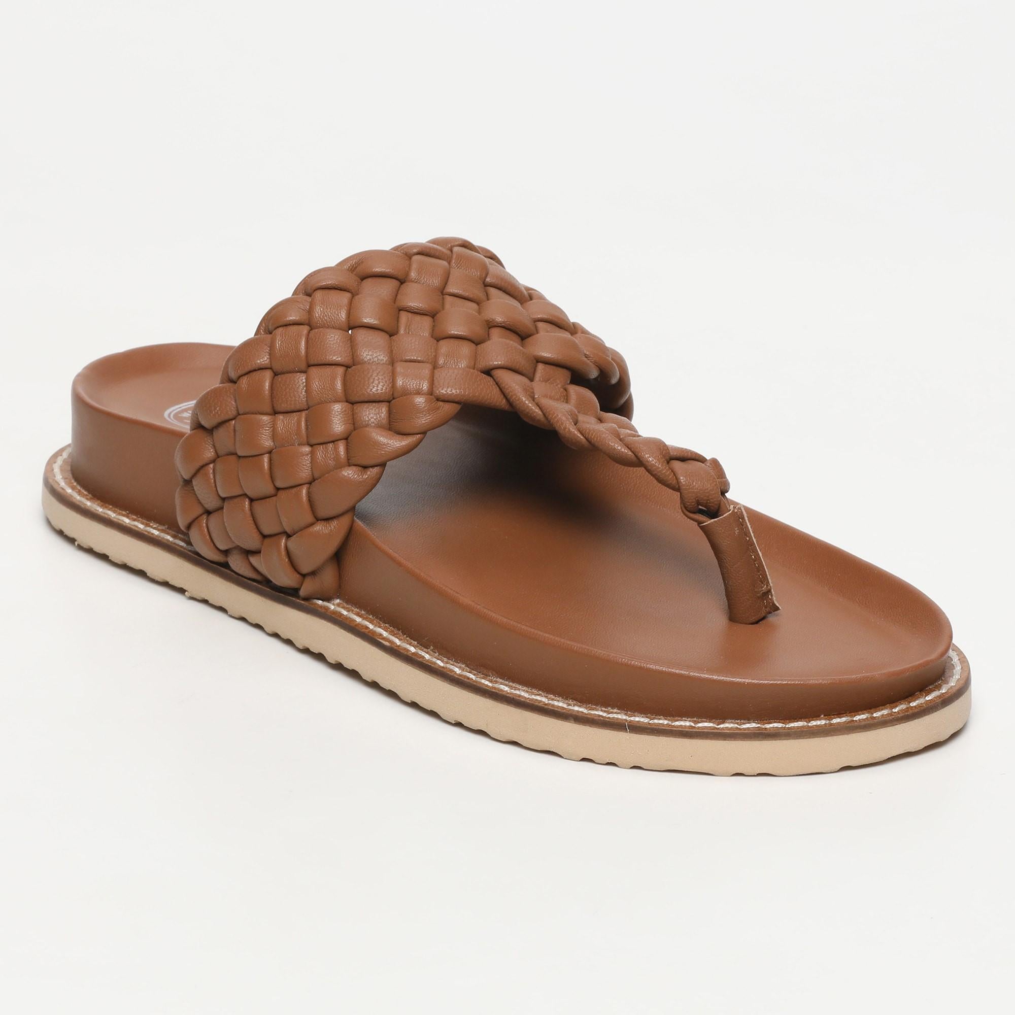 NAVAS mules entre doigt tresse en cuir camel