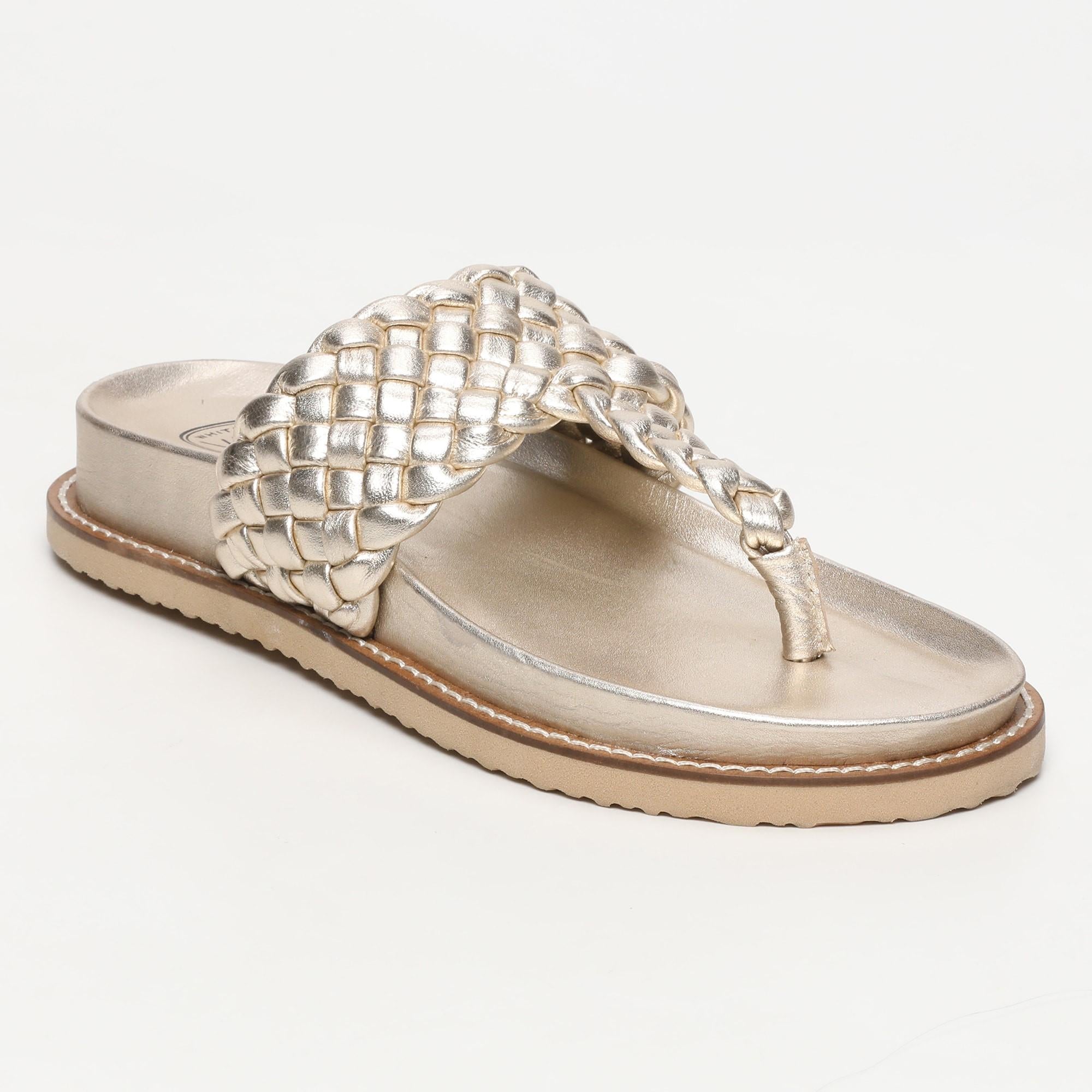 NAVAS mules entre doigt tresse en cuir platine