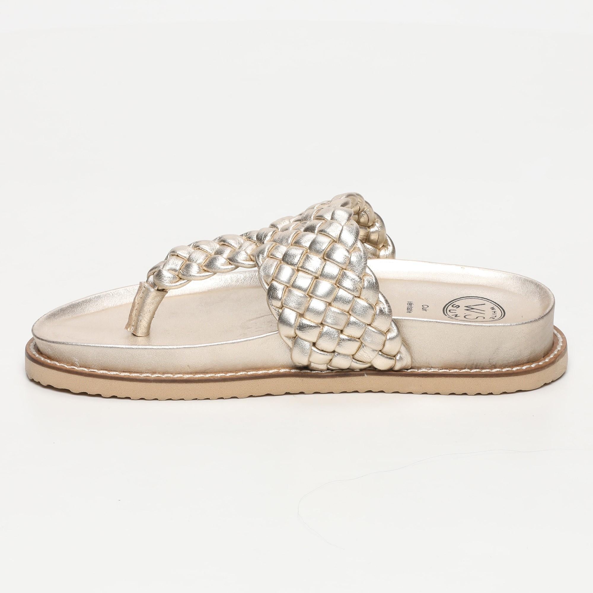 NAVAS mules entre doigt tresse en cuir platine