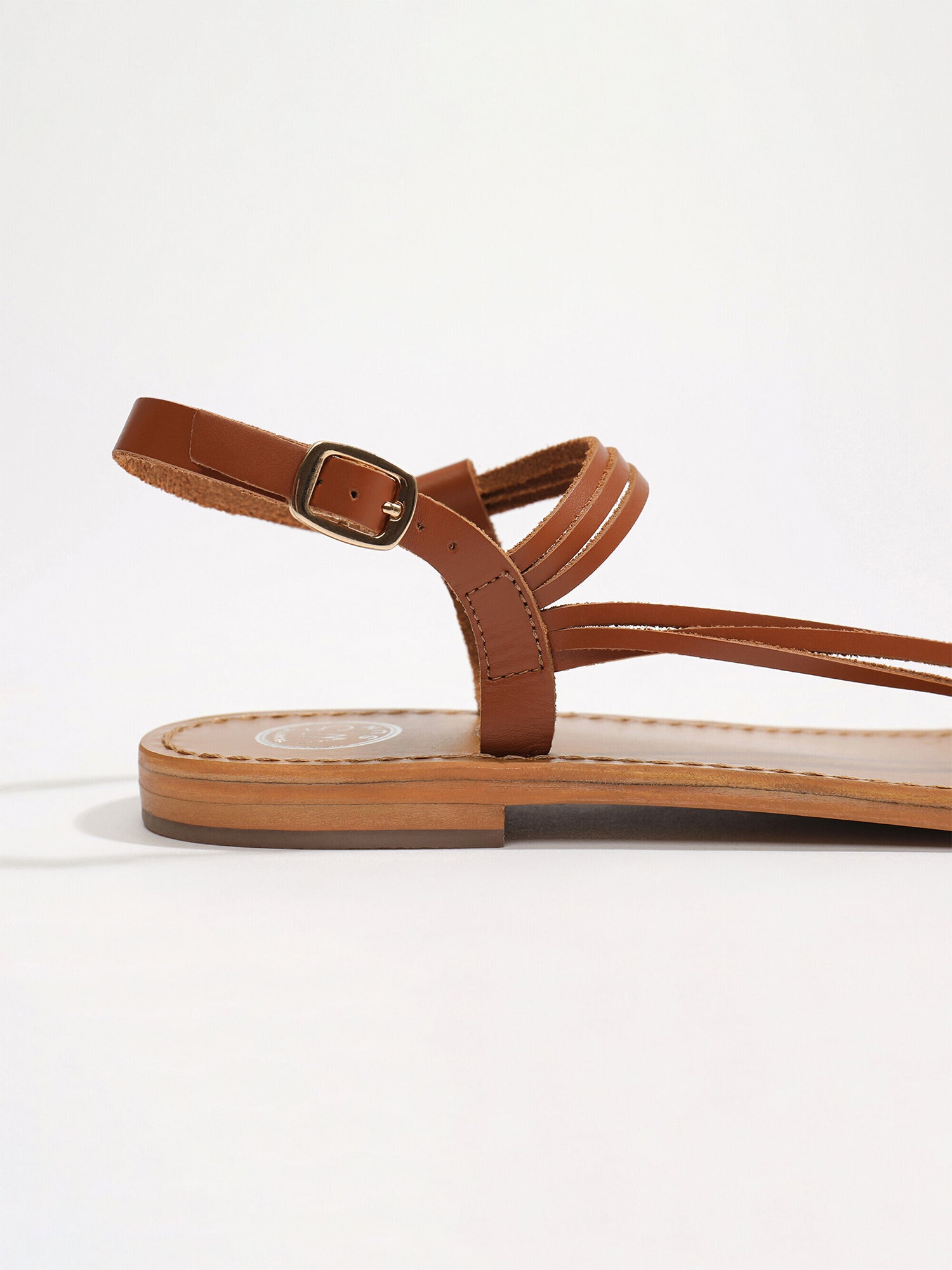 AQUIRAZ sandales entre doigt en cuir camel