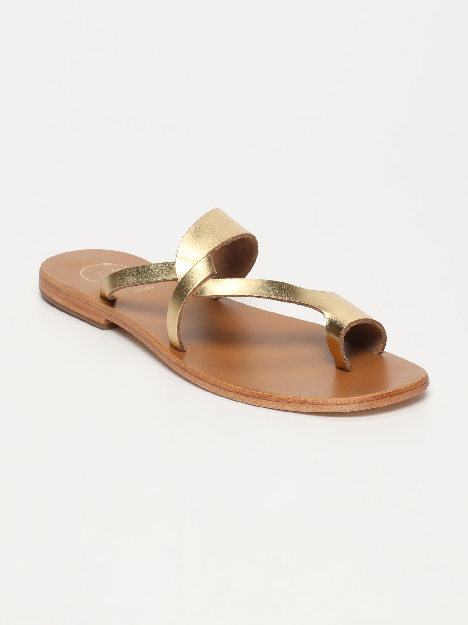 BHADRA mules entre doigt en cuir or foncé