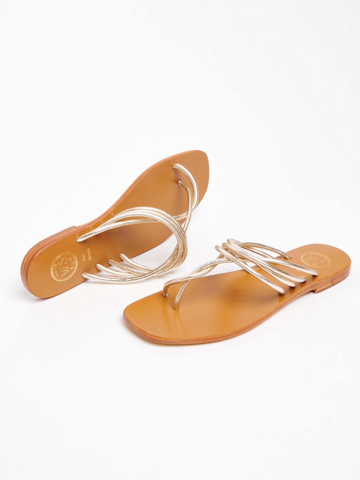 SORAYA mules entre doigt spaghetti en cuir or clair