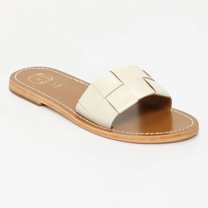 TUCANO mules en cuir ivoire verni